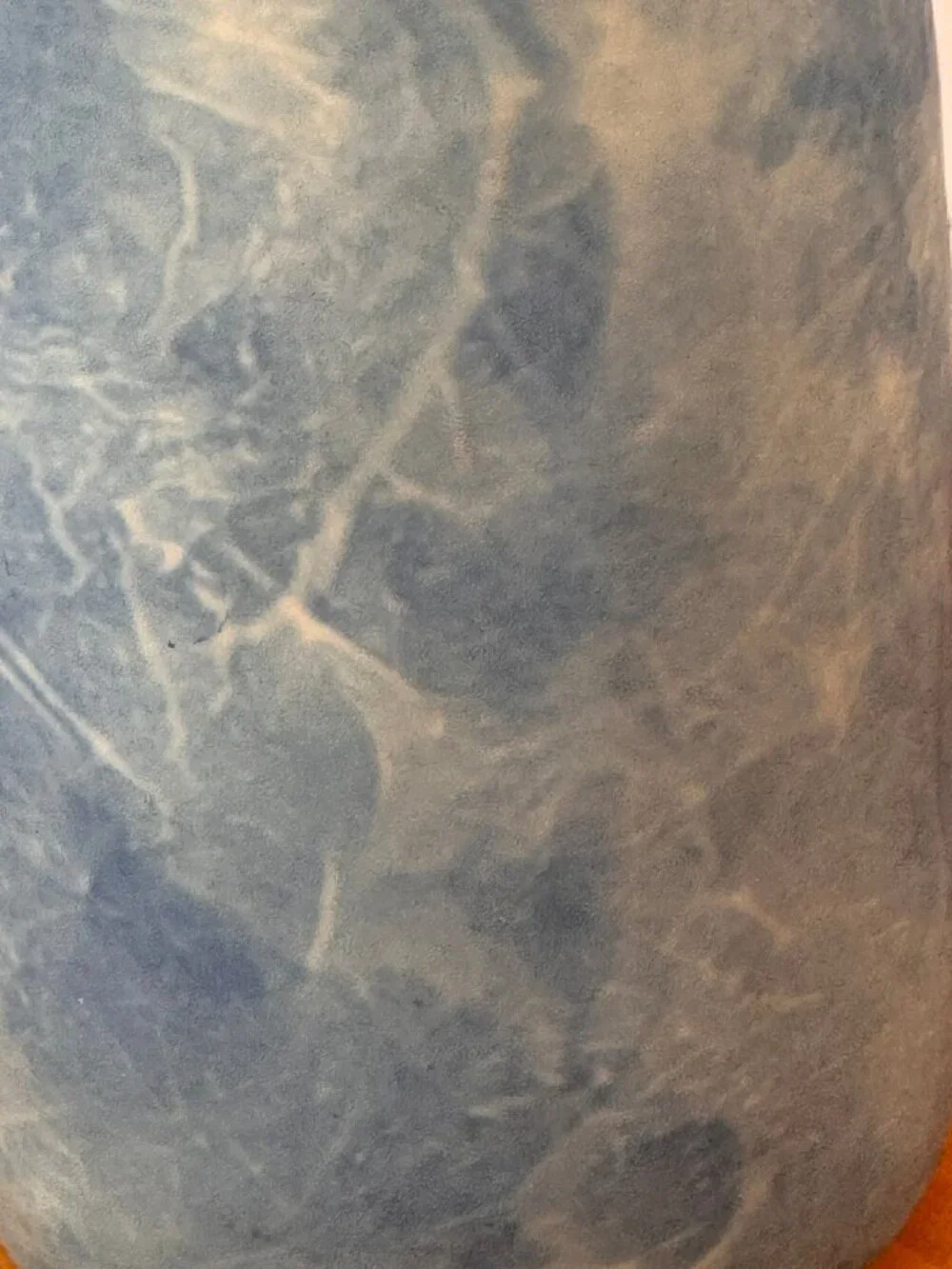 Bud vase or cylinder with blue and white soft cloud like marbled pattern